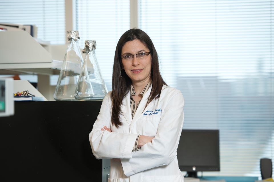 adriana-montano-960 Photo of Dr. Adriana Montano standing in labratory